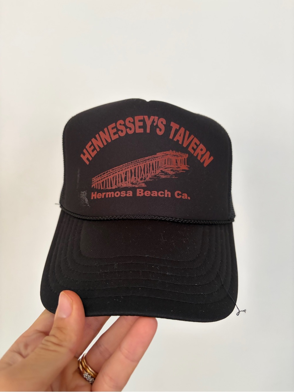 Hennessey’s Hermosa Beach Black Trucker Hat